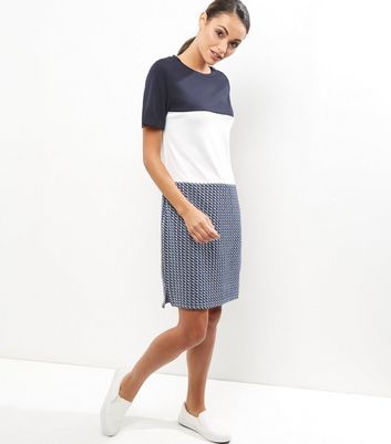 http://media1.newlookassets.com/i/newlook/387127249D1/womens/dresses/day-dresses/blue-colour-block-jacquard-texture-tunic-dress/?$plp_3_row$