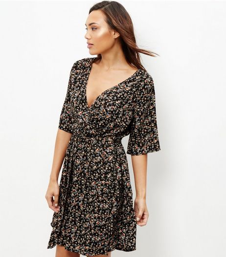 Black Ditsy Floral Print Wrap Front Dress | New Look