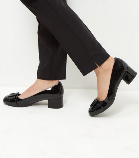 Wide Fit Black Patent Buckle Front Court Shoes | New Look