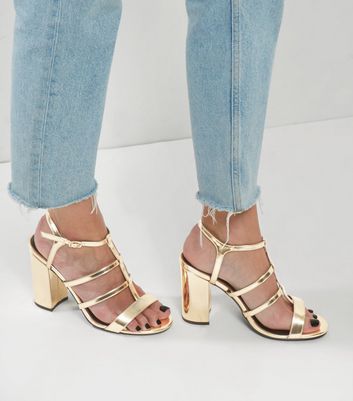 gold block heel gladiator sandals