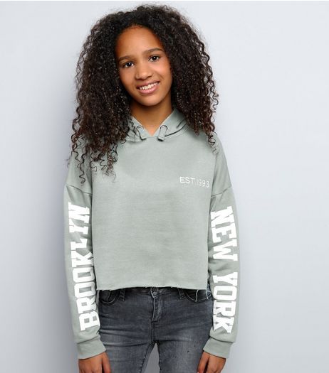 Teens Light Green Brooklyn Print Sleeve Cropped Hoodie | New Look