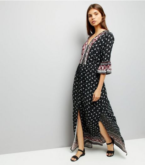 Black Floral Print Bell Sleeve Maxi Dress | New Look