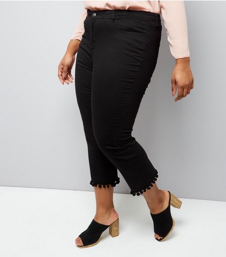 Curves Black Cropped Flared Pom Pom Hem Jeans | New Look