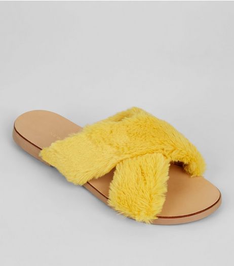Wide Fit Yellow Faux Fur Cross Front Sliders | New Look