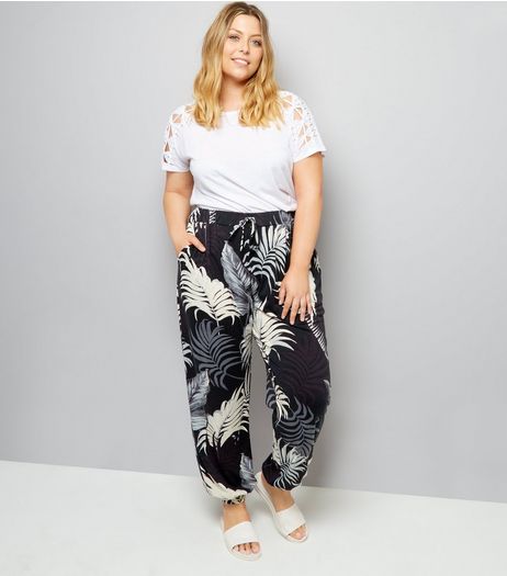 Curves Black Floral Print Tie Waist Joggers | New Look